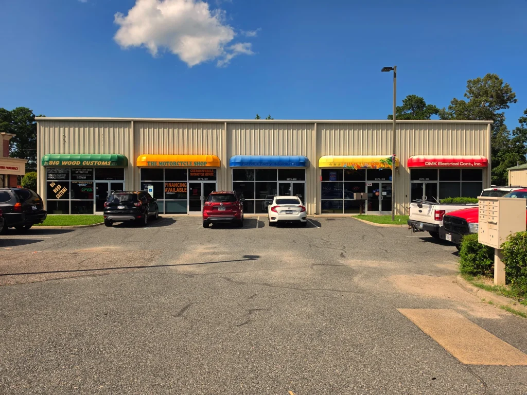 The storefronts at 2973 South Military Highway